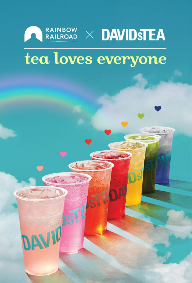 Rainbow-coloured iced teas lined up under a rainbow in the sky.