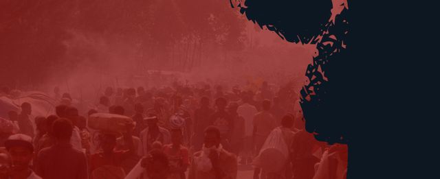 Crowd of people walking outdoors, with dark red overlay.