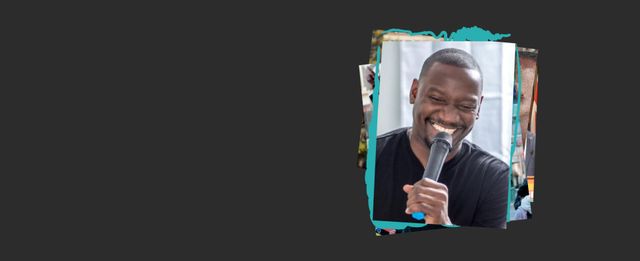 Person smiling while speaking into a microphone.