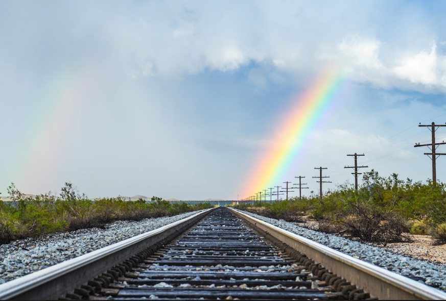 Railroad with rainbow